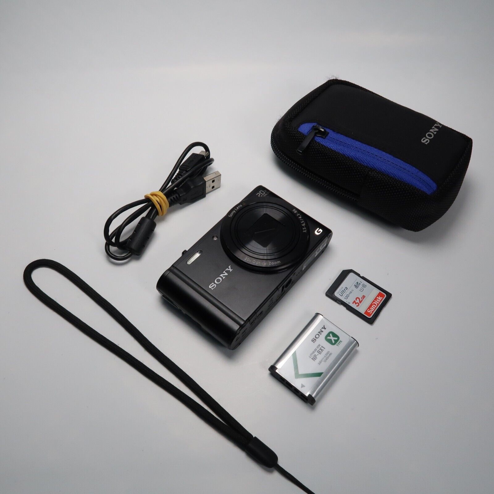 Sony Cyber-Shot DSC-WX300 18.2MP Digital Camera Black with Case and 32GB SD Card
