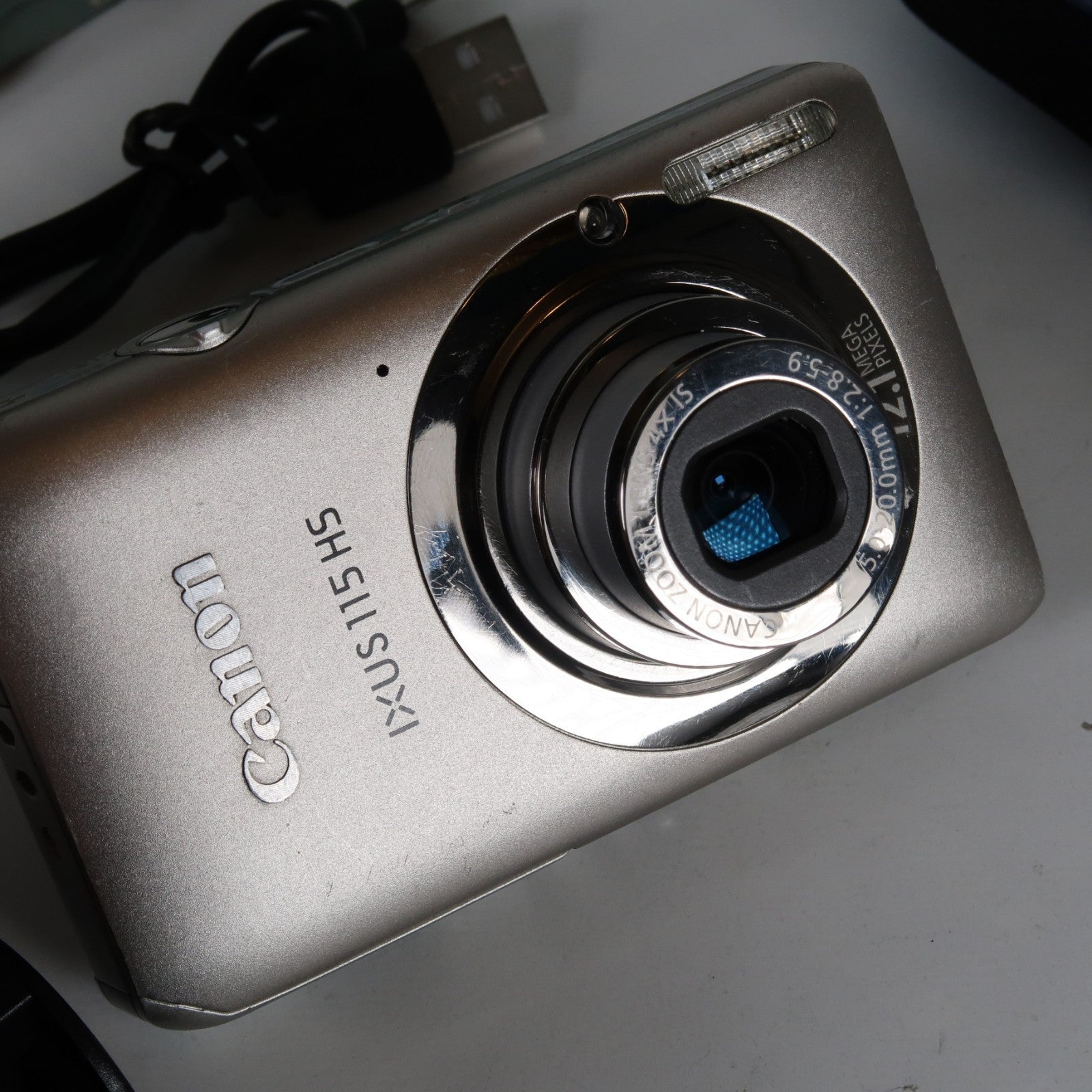 Canon IXUS 115 HS PowerShot ELPH 100 HS 12.1 MP 4x Digital Camera Silver