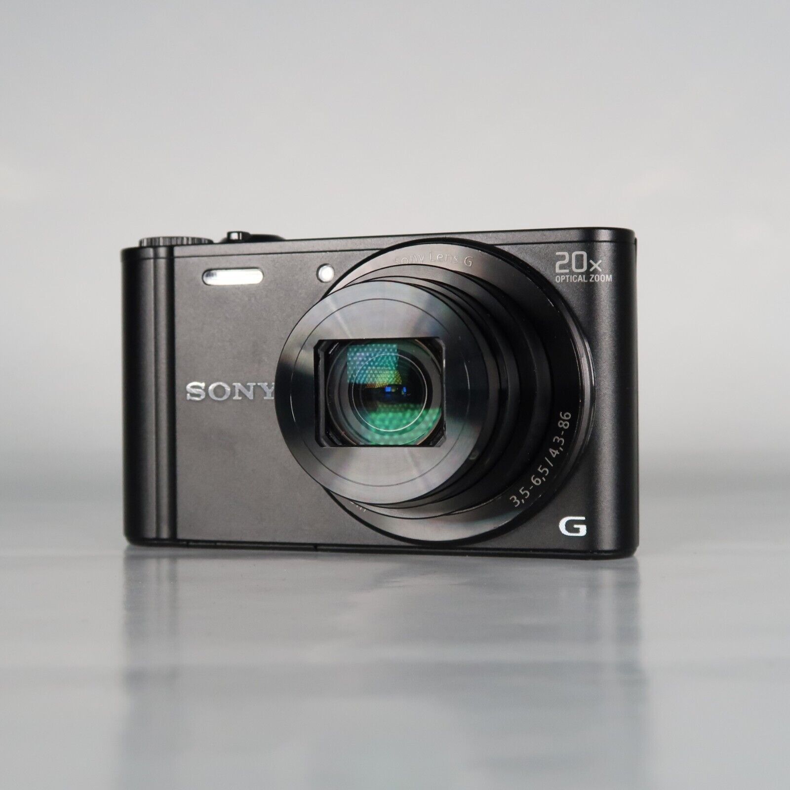 Sony Cyber-Shot DSC-WX300 18.2MP Digital Camera Black with Case and 32GB SD Card