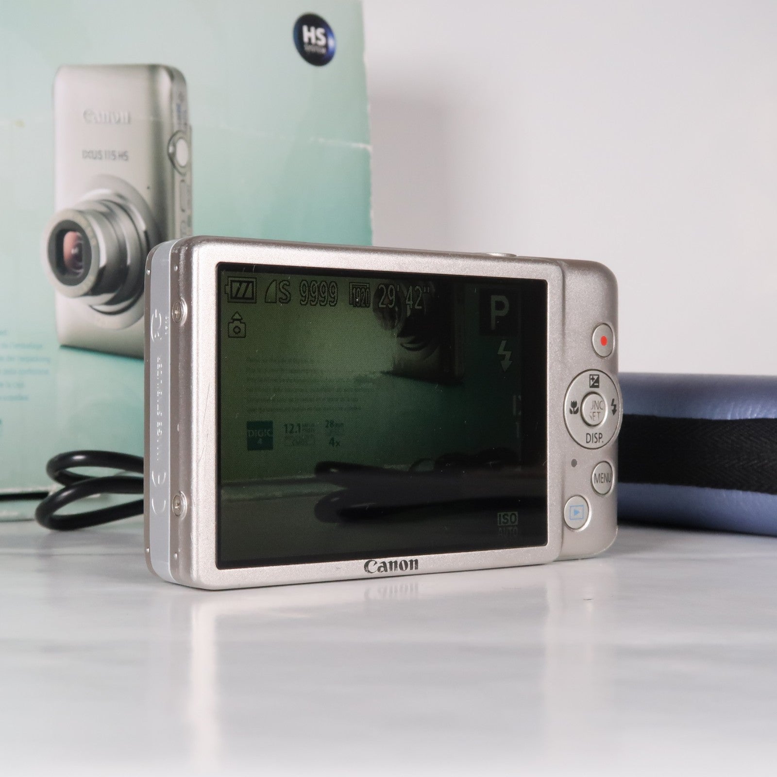 Canon IXUS 115 HS PowerShot ELPH 100 HS 12.1 MP 4x Digital Camera Silver