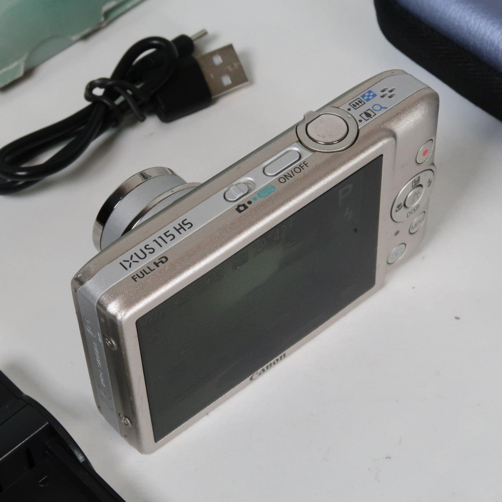 Canon IXUS 115 HS PowerShot ELPH 100 HS 12.1 MP 4x Digital Camera Silver