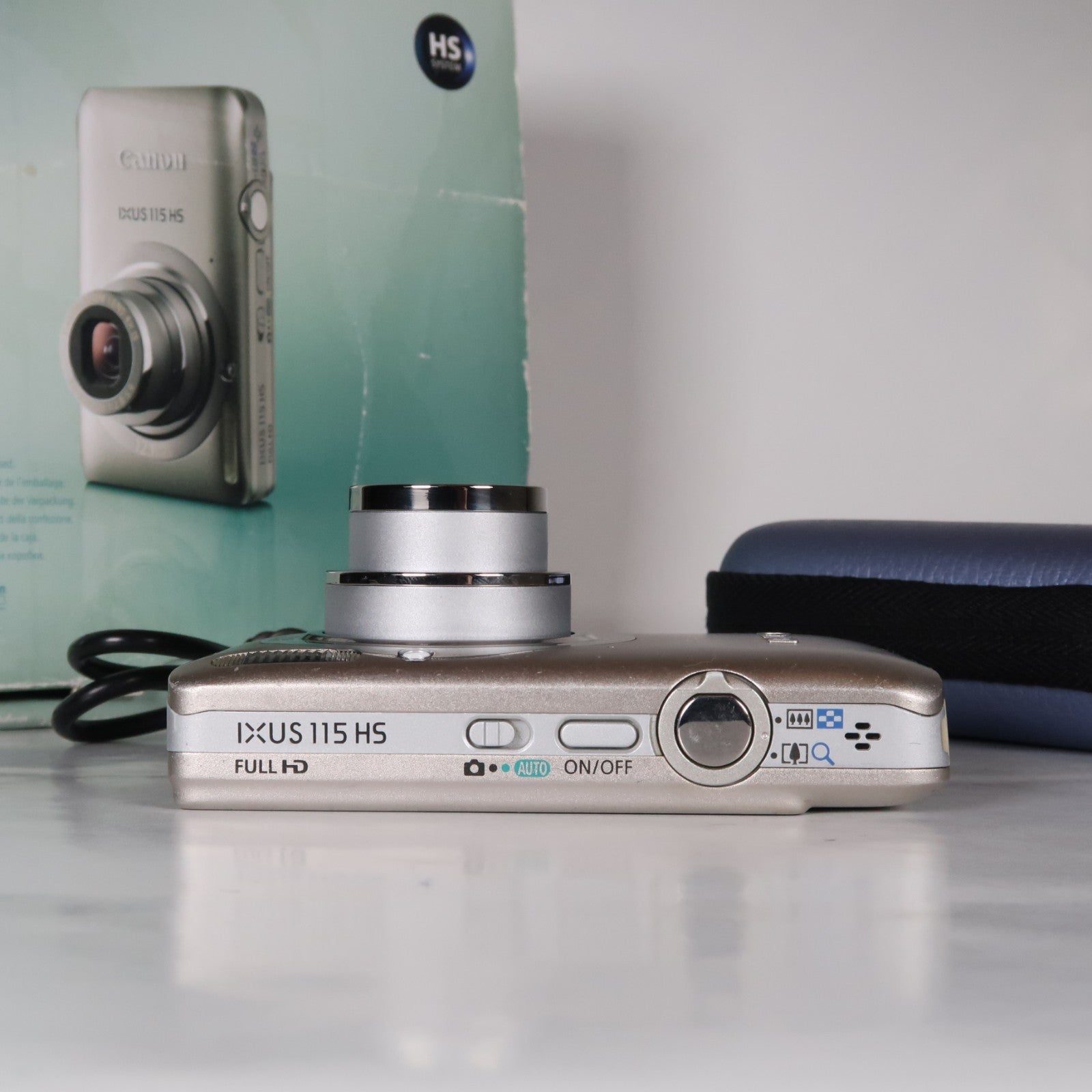 Canon IXUS 115 HS PowerShot ELPH 100 HS 12.1 MP 4x Digital Camera Silver